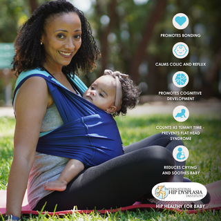 Smiling woman sits on grass holding a baby in a blue carrier. Text highlights benefits: bonding, calming, cognitive development, tummy time, and soothing.