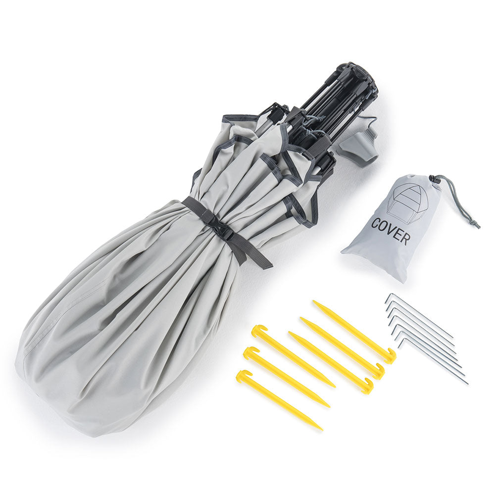 Set of camping tent stakes, carrying bag, and cover on a white background