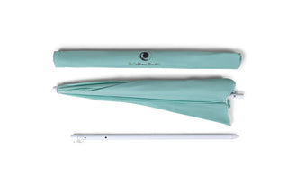 Teal umbrella with handle and shaft on a white background