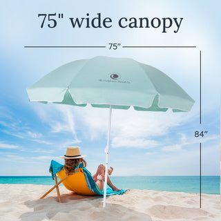 Beach umbrella with measurements on a sandy beach with ocean view