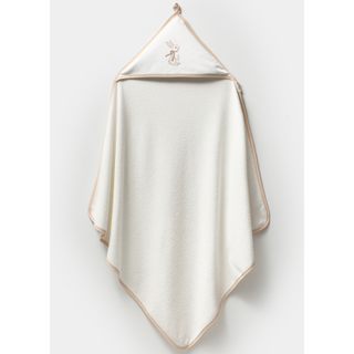 White towel with gold trim hanging on a white background