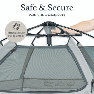Pet carrier with safety locks and a hand demonstrating how to use them.