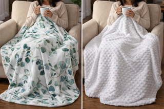 Two people sitting on a couch with different types of blankets, one floral and one white textured.