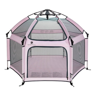 Pink pet playpen with mesh sides on a white background