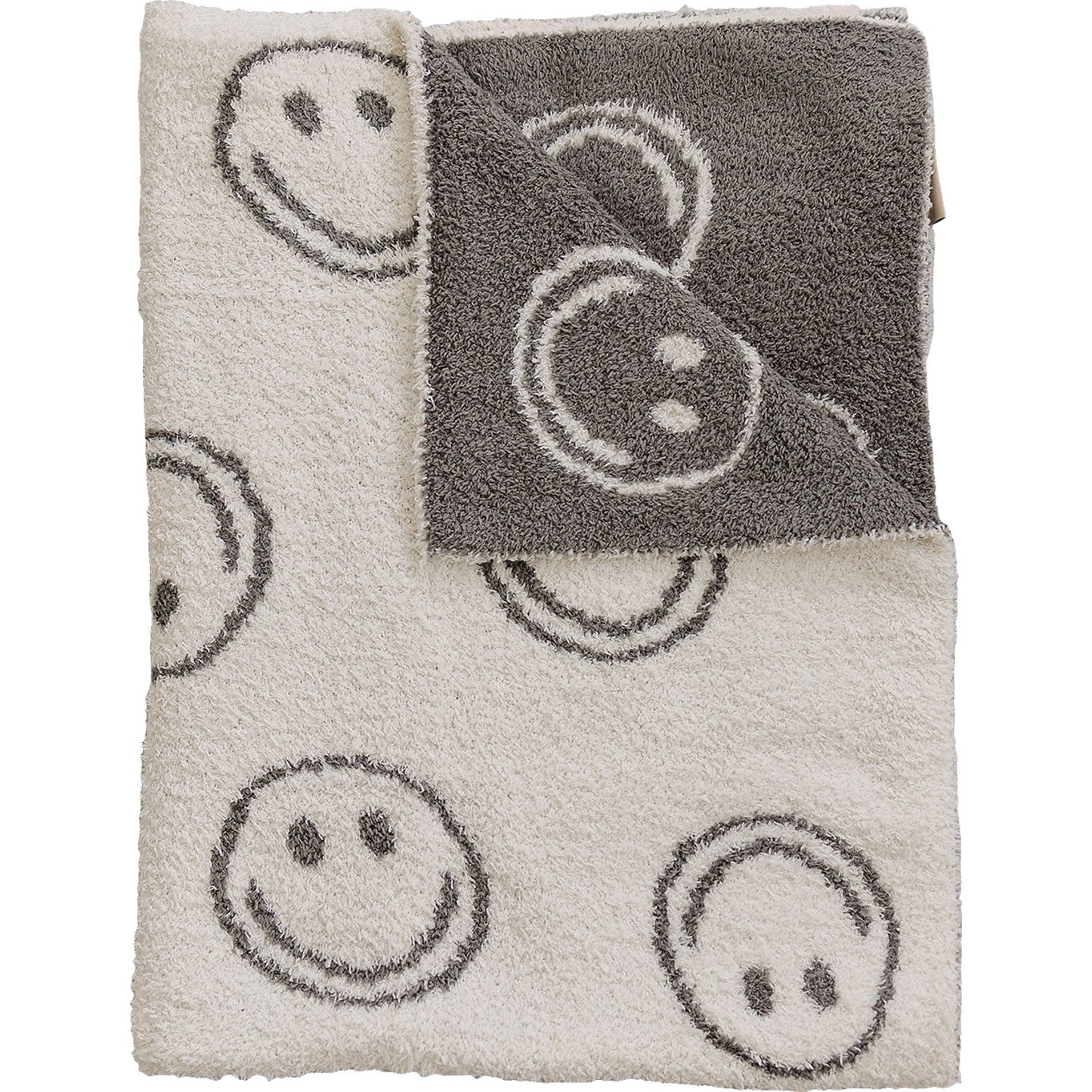 Blanket with smiley face pattern on a white background