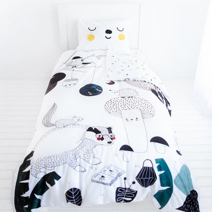 Children's bedding set with animal and nature-themed design on a white background