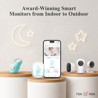 Smart monitors and a phone displaying a baby monitor app on a white background with decorative stars and moon.
