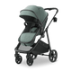 Green and black stroller on a white background
