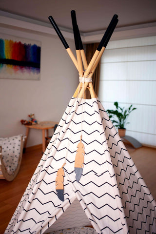 Children's teepee with zigzag pattern in a room setting