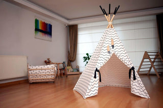 Children's teepee in a room with toys and furniture