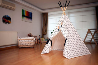 Children's playroom with a teepee and furniture