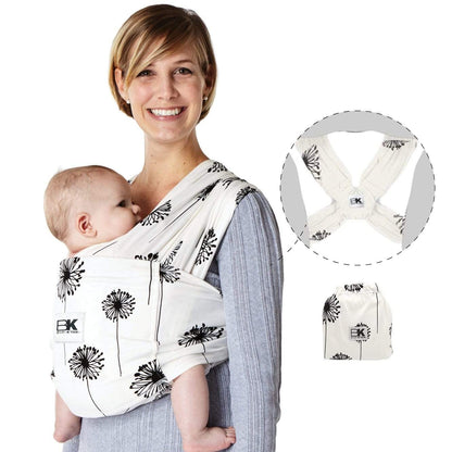 A woman uses a Baby K'tan carrier with a dandelion print, offering a snug and fashionable way to hold her infant.