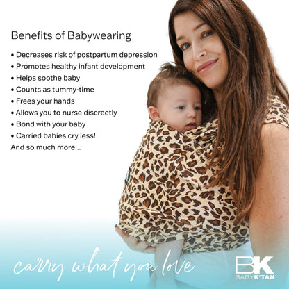 A women with a baby in a Baby K'tan carrier, showcasing a nurturing bond between them.